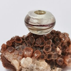 Veliki privezak nalik pandora privesku sa kosom